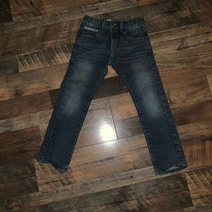Two pairs of jeans boys size 7 one pair of shorts